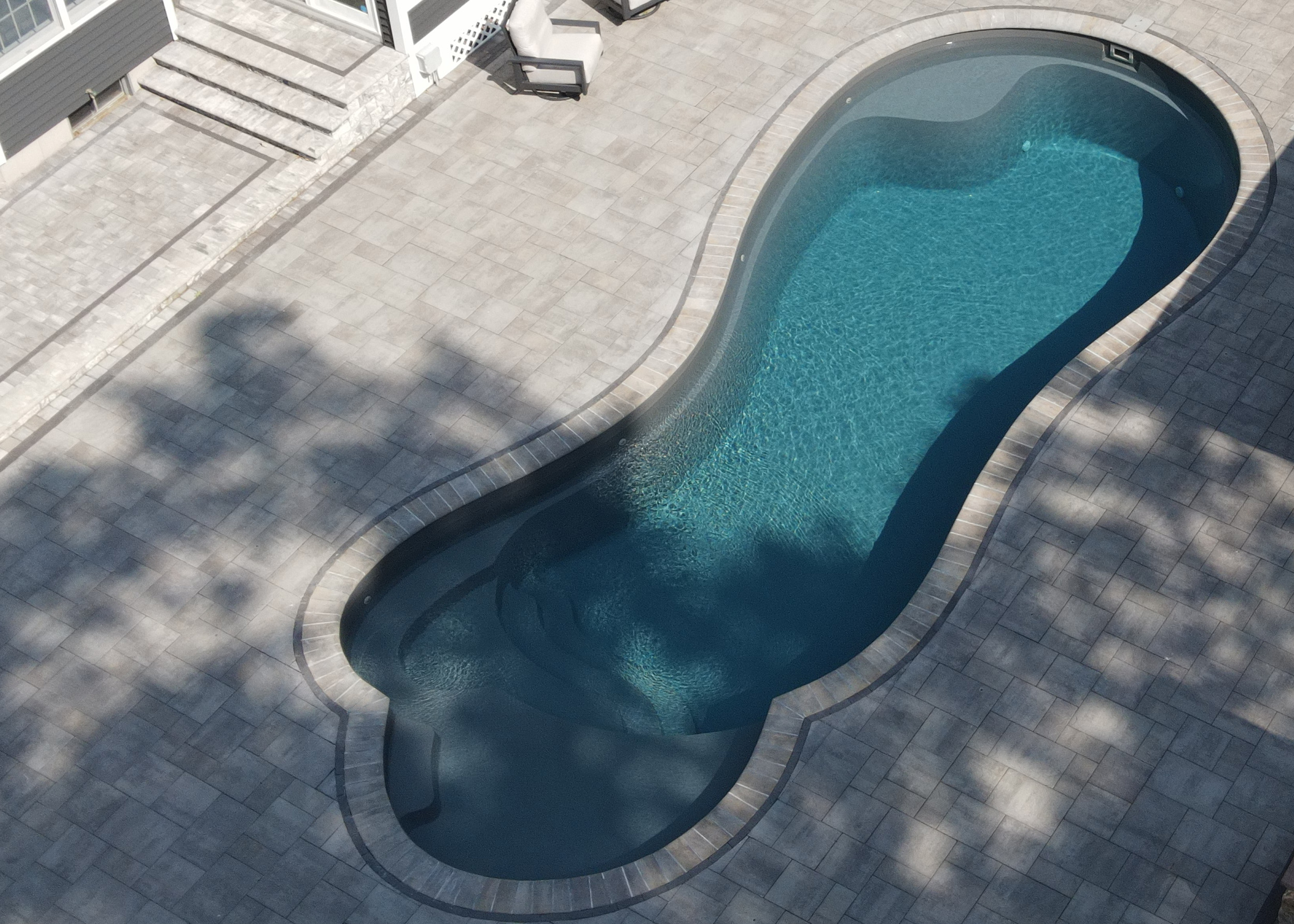 Curved fiberglass pool